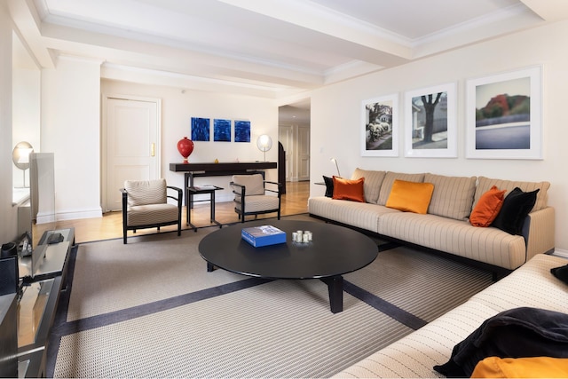 living room with ornamental molding and hardwood / wood-style flooring