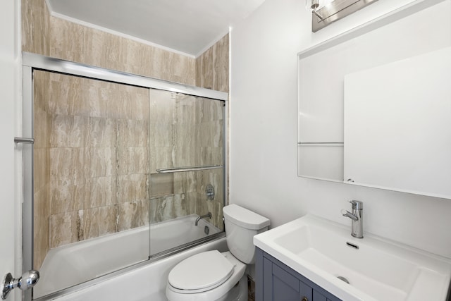 full bathroom with vanity, toilet, and enclosed tub / shower combo