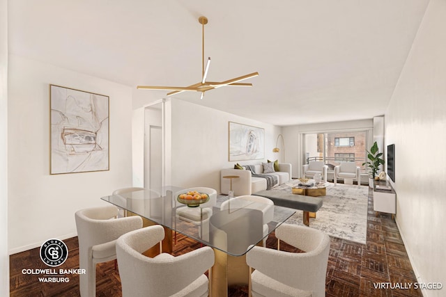 dining room with dark parquet flooring