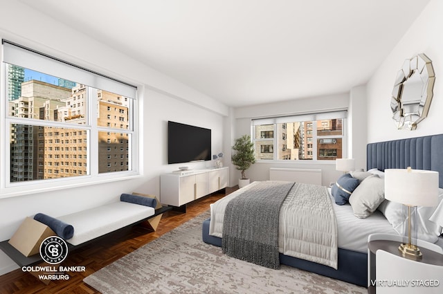 bedroom featuring parquet floors