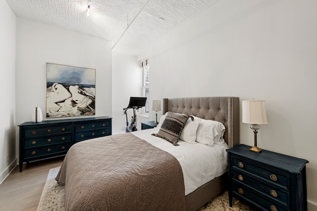 bedroom featuring light hardwood / wood-style flooring