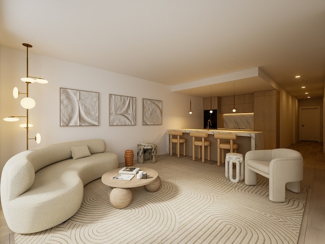 living room featuring sink and light wood-type flooring