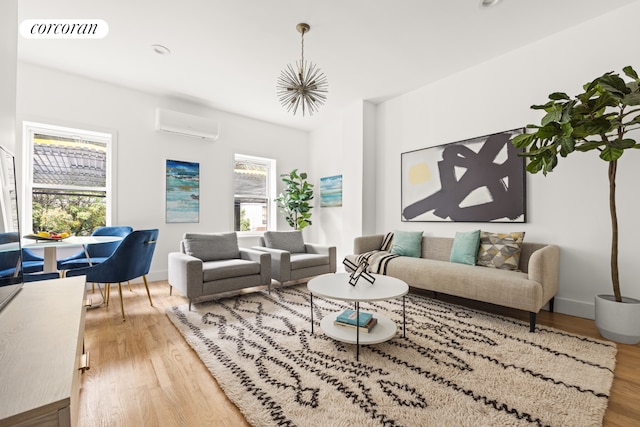 living room featuring a wall unit AC and hardwood / wood-style floors