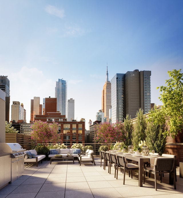 view of patio / terrace with an outdoor hangout area and a grill