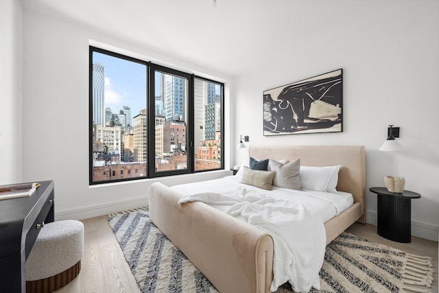 bedroom featuring hardwood / wood-style floors