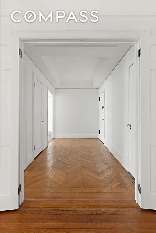 hallway with parquet floors