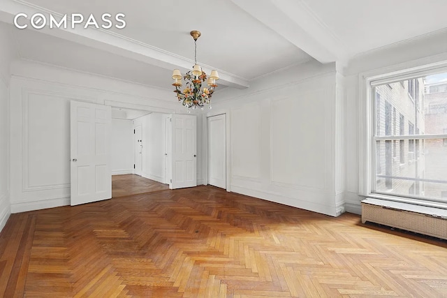 unfurnished room with radiator, beamed ceiling, parquet floors, crown molding, and a chandelier