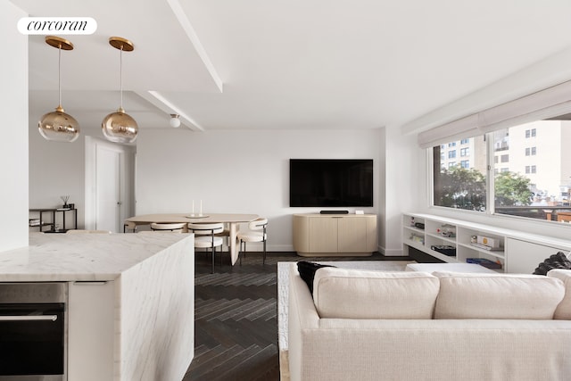 living room with dark parquet floors