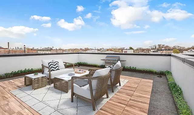 view of patio / terrace featuring a fire pit, a water view, and grilling area