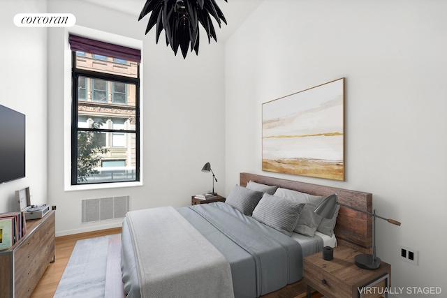 bedroom featuring light hardwood / wood-style flooring