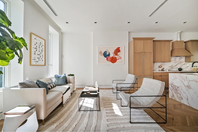 living room with light parquet floors