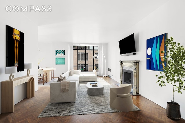 living room featuring parquet flooring and a premium fireplace