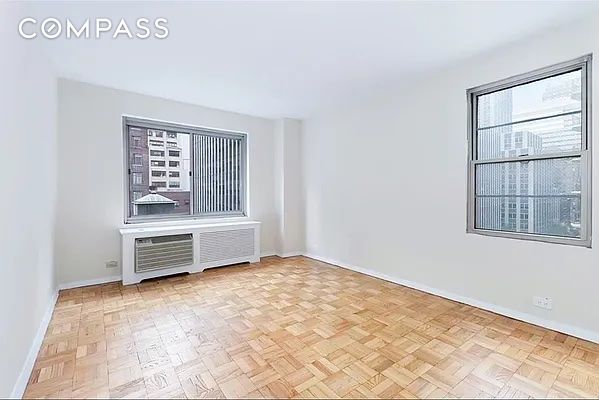 empty room featuring light parquet flooring