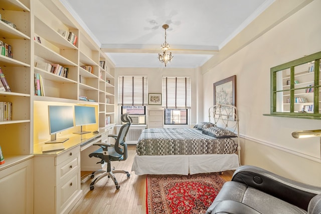 bedroom with light hardwood / wood-style flooring, a chandelier, and ornamental molding