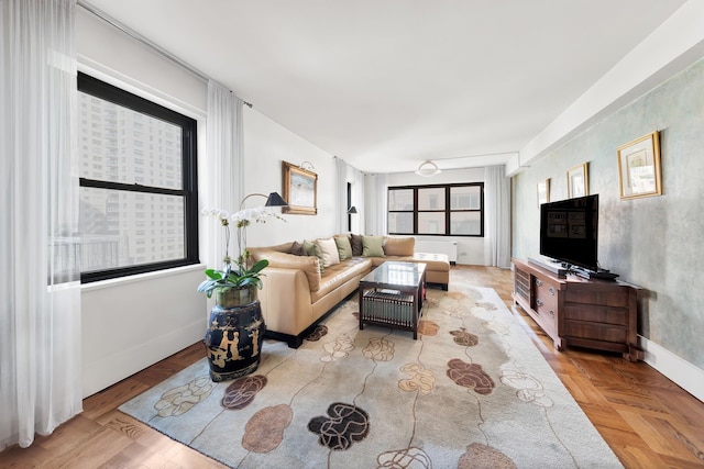 living room featuring light parquet floors