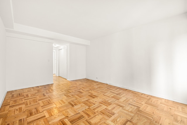 empty room featuring light parquet flooring