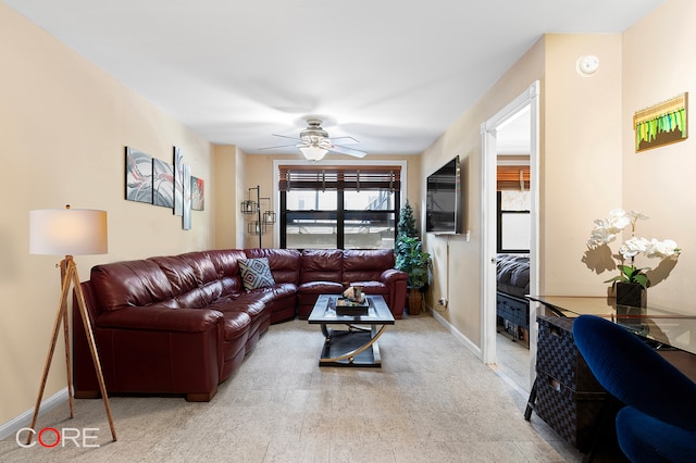 living room featuring ceiling fan