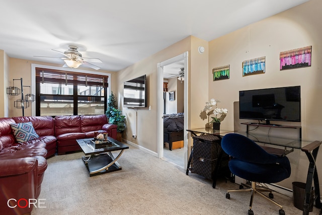 living room featuring ceiling fan