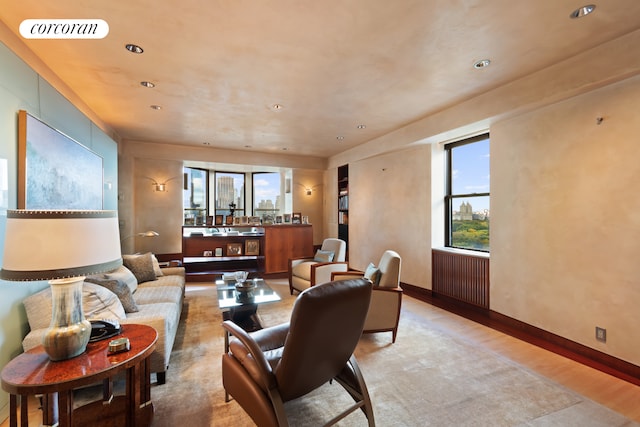 living room with light hardwood / wood-style floors