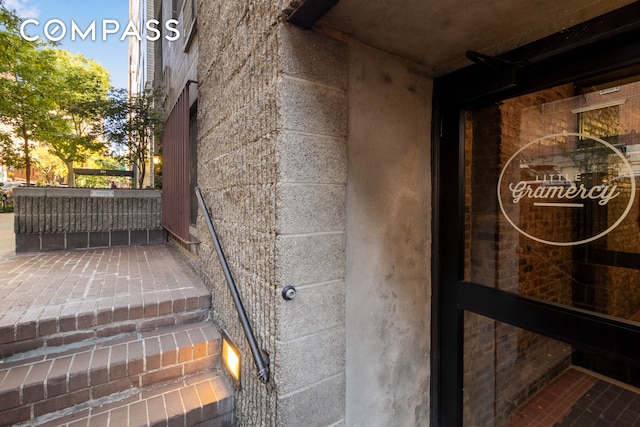 doorway to property with a porch