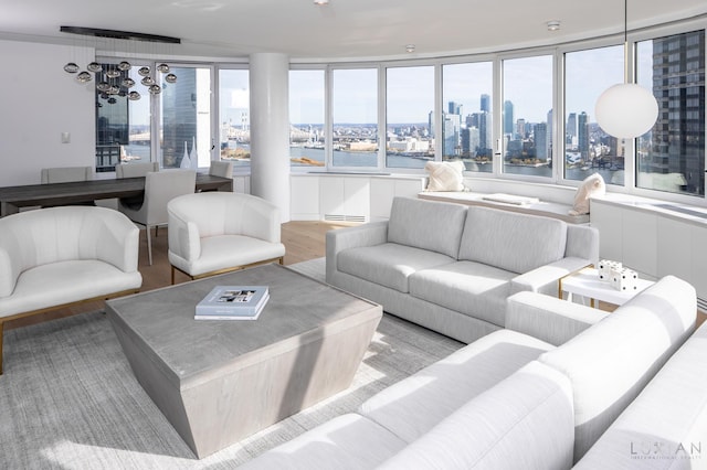 living room featuring light hardwood / wood-style flooring and a wealth of natural light