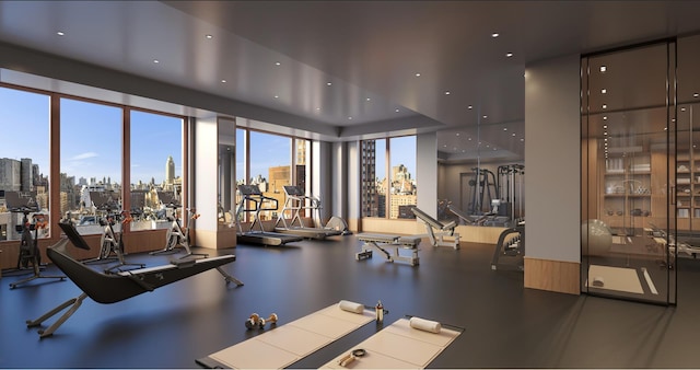 exercise room featuring expansive windows