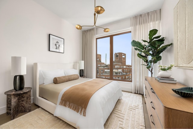 bedroom featuring light hardwood / wood-style floors