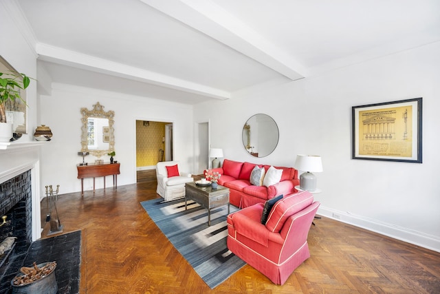 living room with parquet floors and beam ceiling