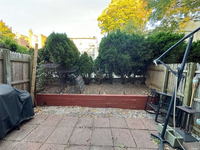 view of patio with a grill