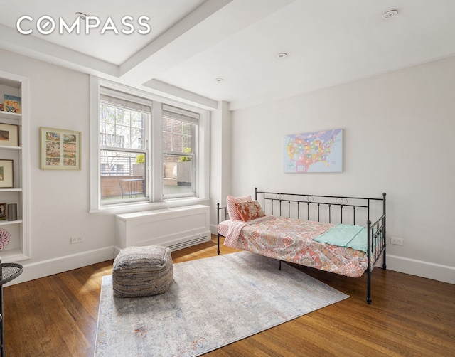 bedroom with wood-type flooring