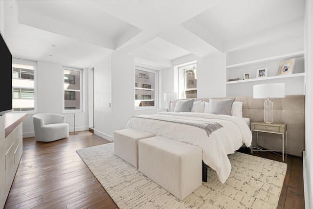 bedroom with hardwood / wood-style floors