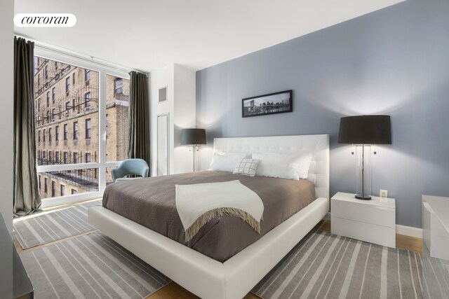 bedroom featuring hardwood / wood-style floors