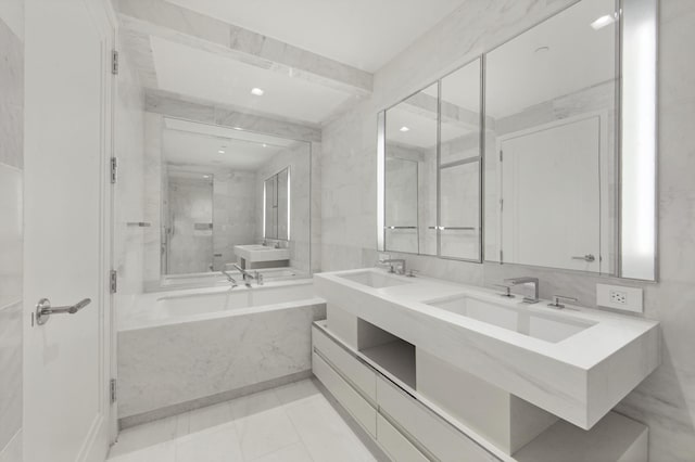 bathroom with vanity, tile patterned floors, and separate shower and tub