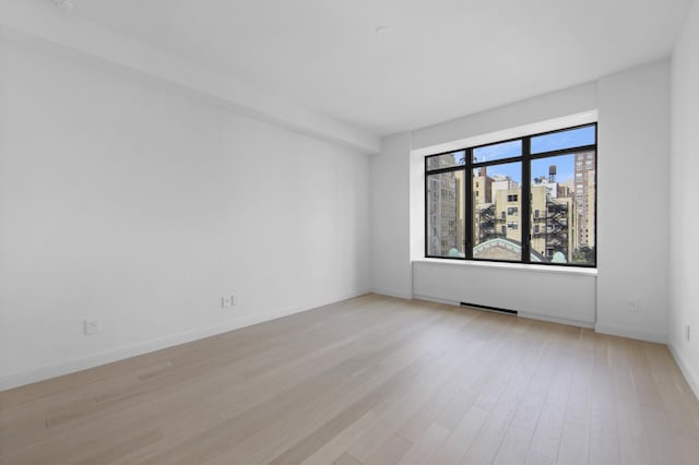 empty room featuring light hardwood / wood-style flooring