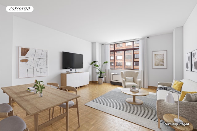 living room with light parquet floors