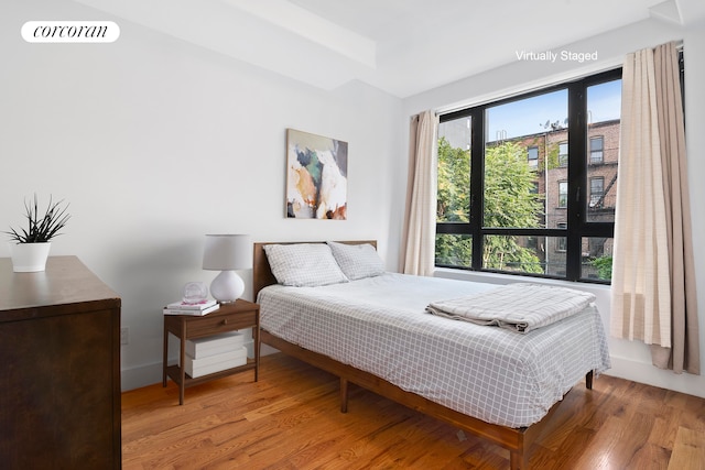 bedroom featuring light wood-type flooring