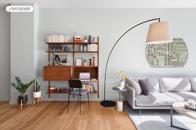 sitting room with light wood-type flooring