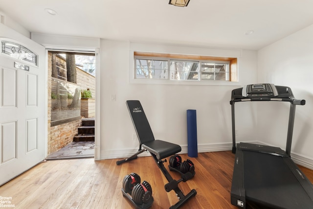 exercise area with hardwood / wood-style flooring