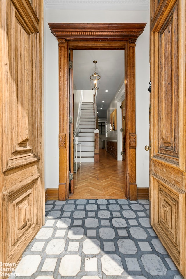 corridor with light parquet flooring