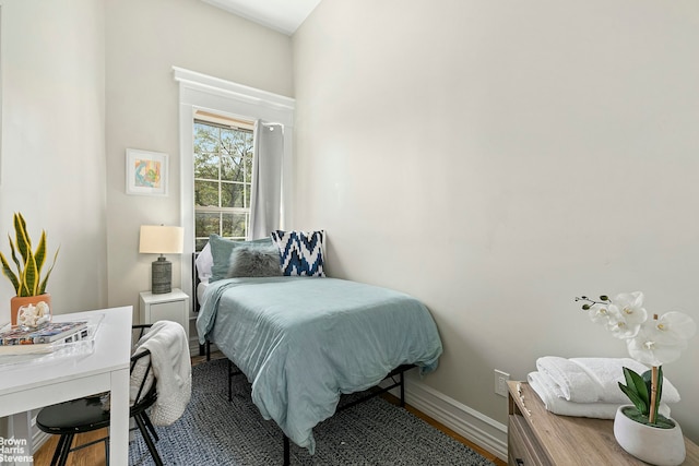 bedroom featuring hardwood / wood-style flooring