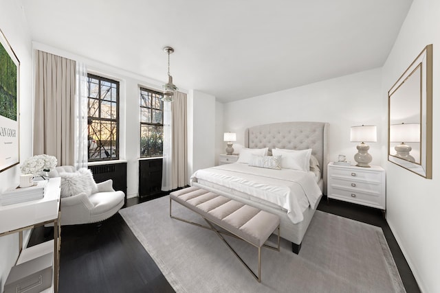 bedroom featuring dark hardwood / wood-style floors