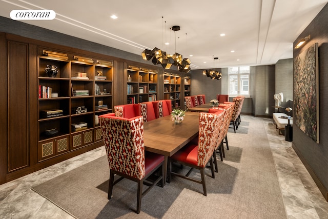 dining space with a notable chandelier