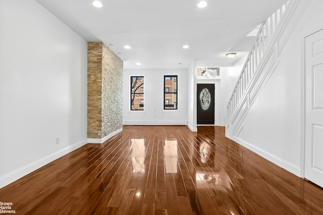 foyer entrance featuring hardwood / wood-style floors