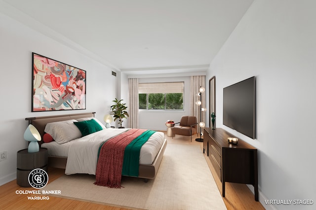 bedroom featuring light hardwood / wood-style flooring