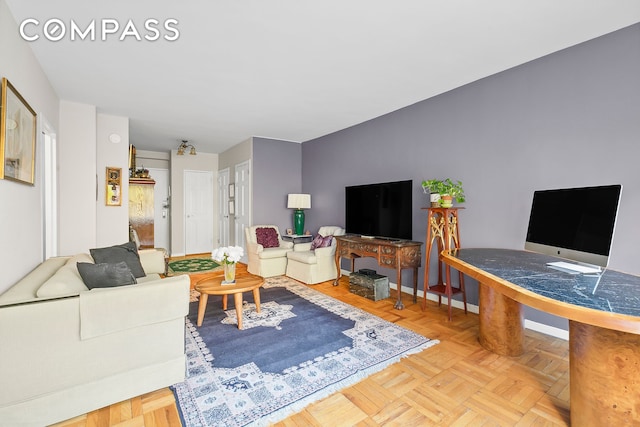 living room with parquet floors