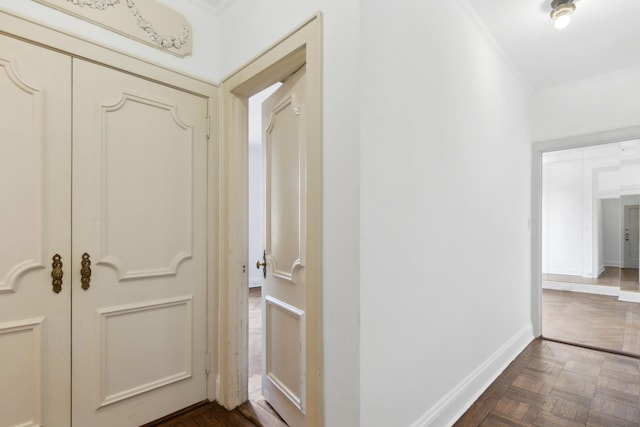 unfurnished room featuring parquet flooring