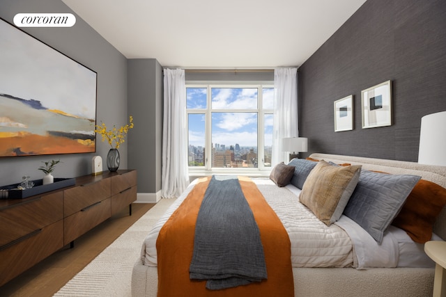 bedroom featuring hardwood / wood-style flooring