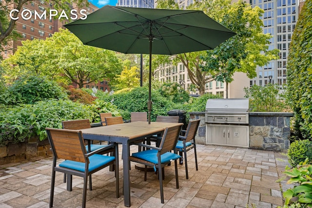 view of patio with a grill and exterior kitchen