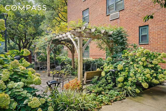 surrounding community featuring a patio and a pergola