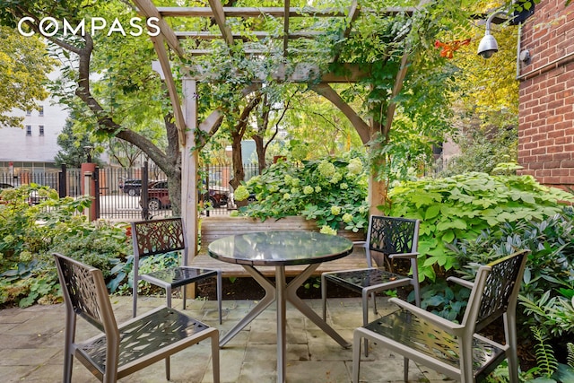 view of patio featuring a pergola